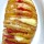 Hasselback potato with pepperoni and cheese